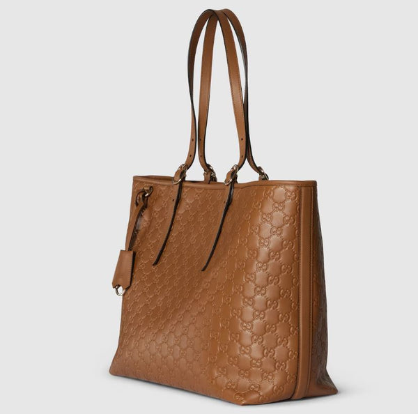 توت باق GG إمبلم الكبيرة