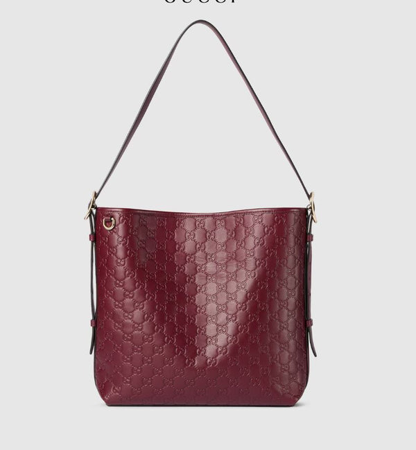 قوتشي جي جي إمبلم