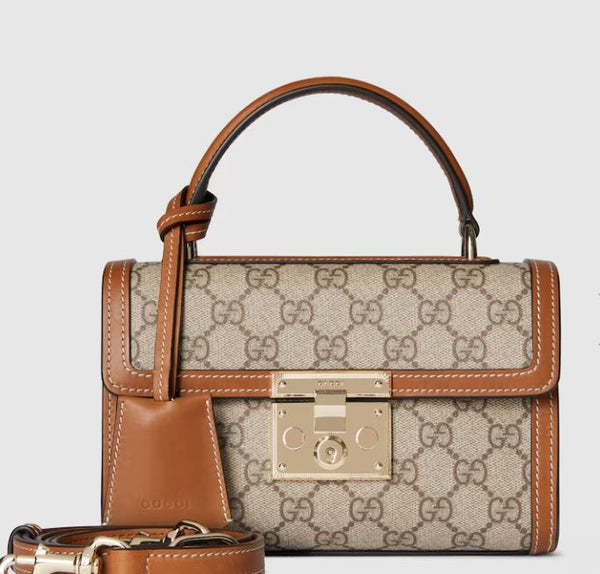 قوتشي بادلوك توب هاندل