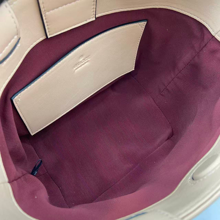 توت جلد قوتشي بيتي بتصميم فاخر بسيط